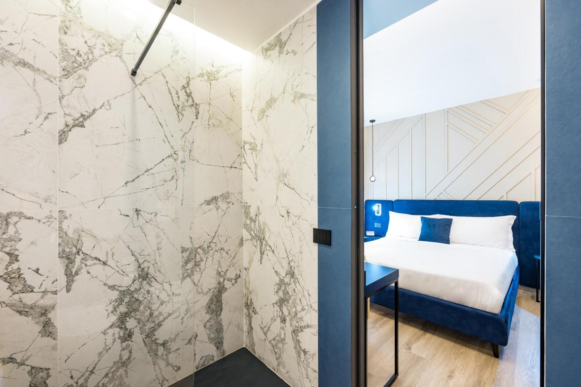 Mh Suites Plebiscito Napoli Bagian luar foto